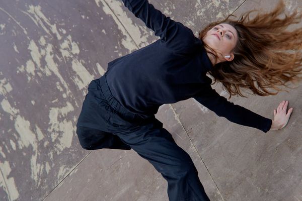 Person in mid-motion showing fluid movement.